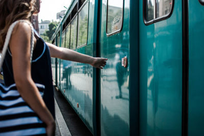 Rear view of woman in bus