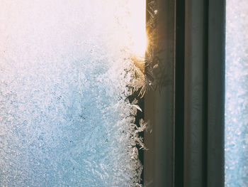 Close-up of frozen glass window