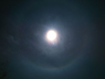 Low angle view of moon against sky at night