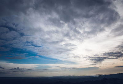 Scenic view of dramatic sky over landscape