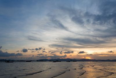 Scenic view of sea against sky at sunset