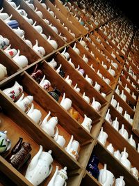 Stack of bottles in shelf