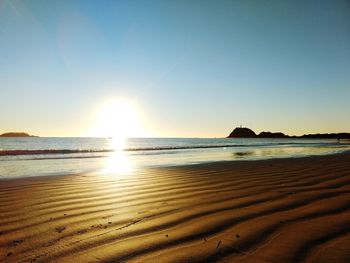 View of beach at sunset