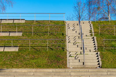 Stairs in stadium against clear sky