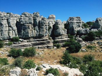 Built structure on cliff against clear sky