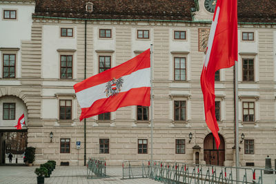 Red flag against buildings in city