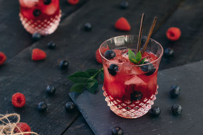 Close-up of red berries on table