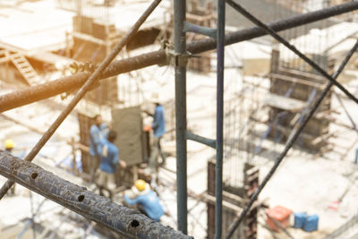 Workers are building in the construction area.