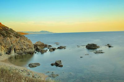 Scenic view of sea against sky during sunset