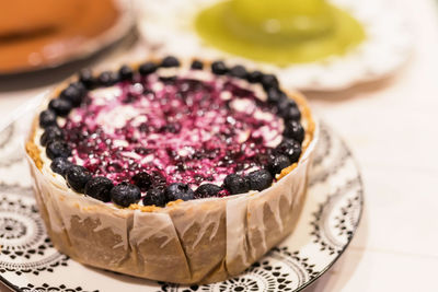 Close-up of cake served on table