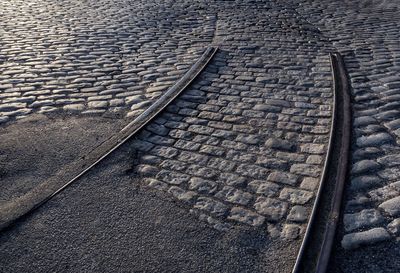 Street lights on brick wall