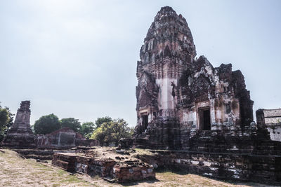 Old temple against building