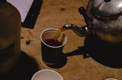 High angle view of coffee cup on table