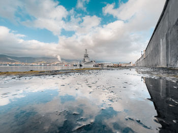 View of city against cloudy sky