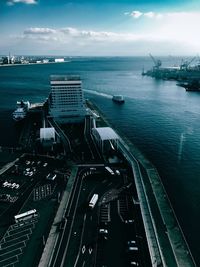 High angle view of buildings by sea at harbor