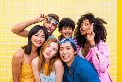 Portrait of smiling friends enjoying party