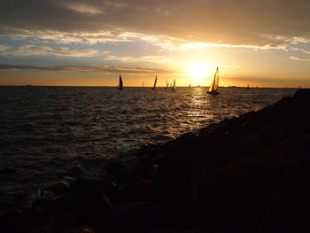 Scenic view of sea against sky during sunset