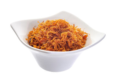 High angle view of food in bowl against white background