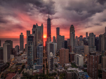 Cityscape against sky during sunset