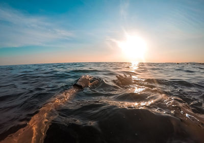 Sunset swimming in first person view