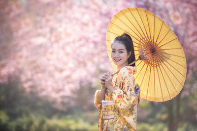 Woman holding umbrella