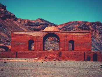 View of historic building against mountain