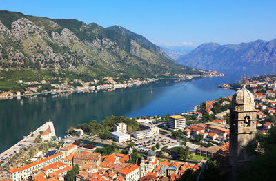 High angle view of town by lake