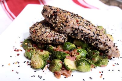 Close-up of tuna and brussels sprouts served in plate