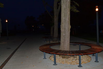 Close-up of illuminated street light at night