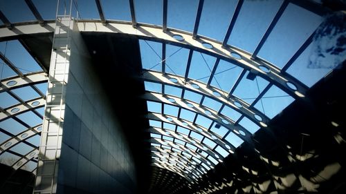 Low angle view of metal structure against sky