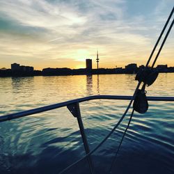 Scenic view of river against sky during sunset