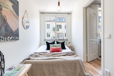 Cushions on bed at home