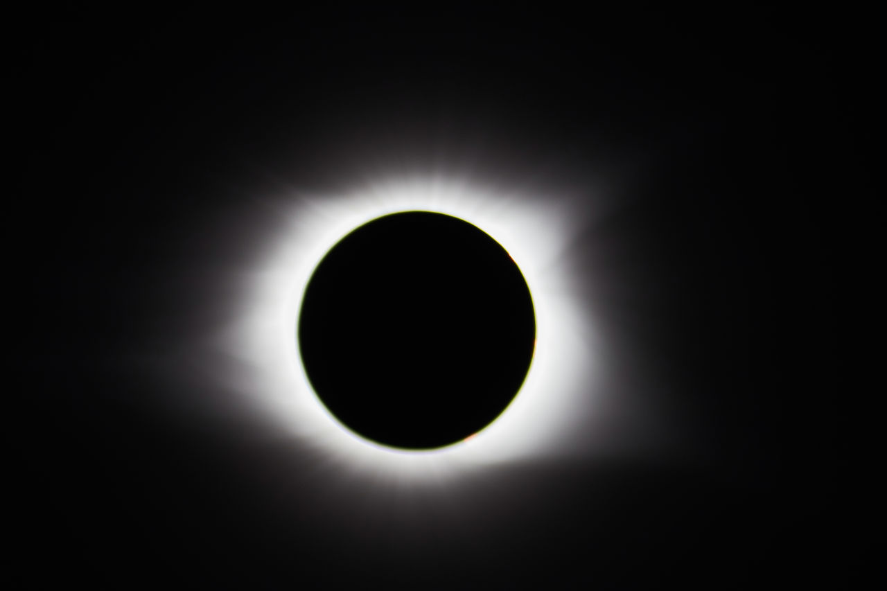 space, corona, astronomy, natural phenomenon, eclipse, moon, sky, night, circle, nature, geometric shape, no people, shape, beauty in nature, solar eclipse, black, celestial event, event, outdoors, black background