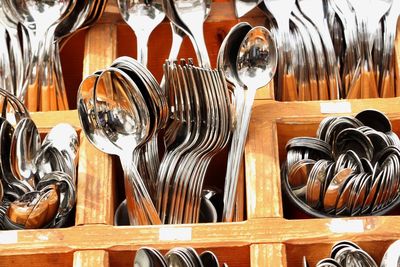 Close-up of objects in row at kitchen