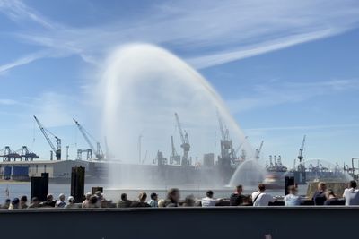 Low angle view of fountain against sky