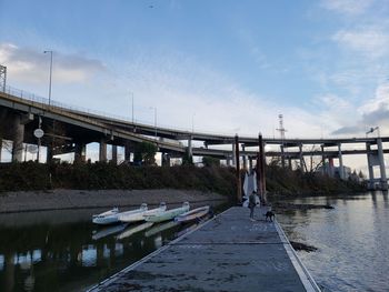 Bridge over river against sky