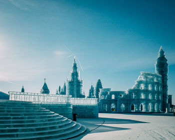 View of temple building against blue sky