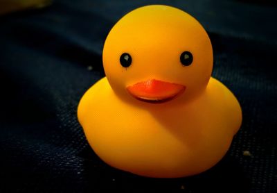 High angle view of yellow toy on table