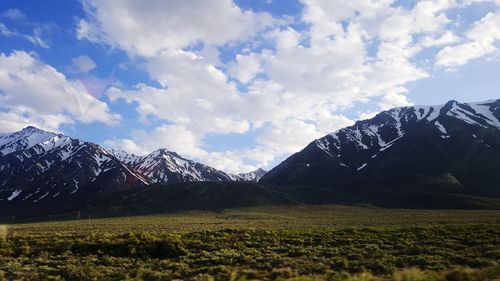 Scenic view of snowcapped mountains against sky