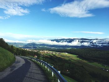 Scenic view of agricultural landscape against sky