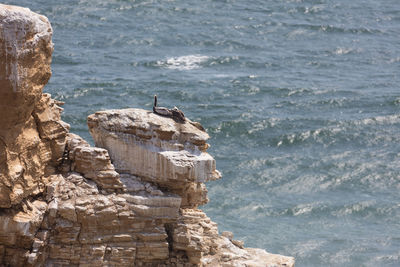 View of sea from rock formation