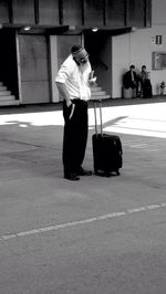 Rear view of man in city