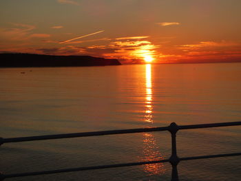 Scenic view of sea at sunset