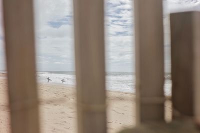 Scenic view of sea seen through window