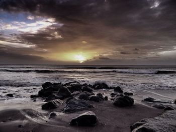 Scenic view of sea against sky during sunset