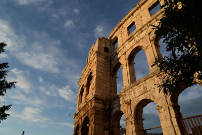 Low angle view of historical building against sky