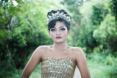 Portrait of young woman wearing tiara