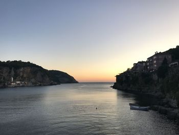 Scenic view of sea against clear sky during sunset