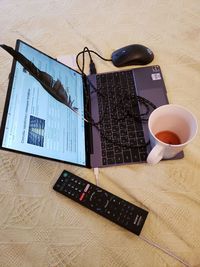 High angle view of coffee cup on table