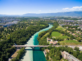 High angle view of river amidst buildings in city